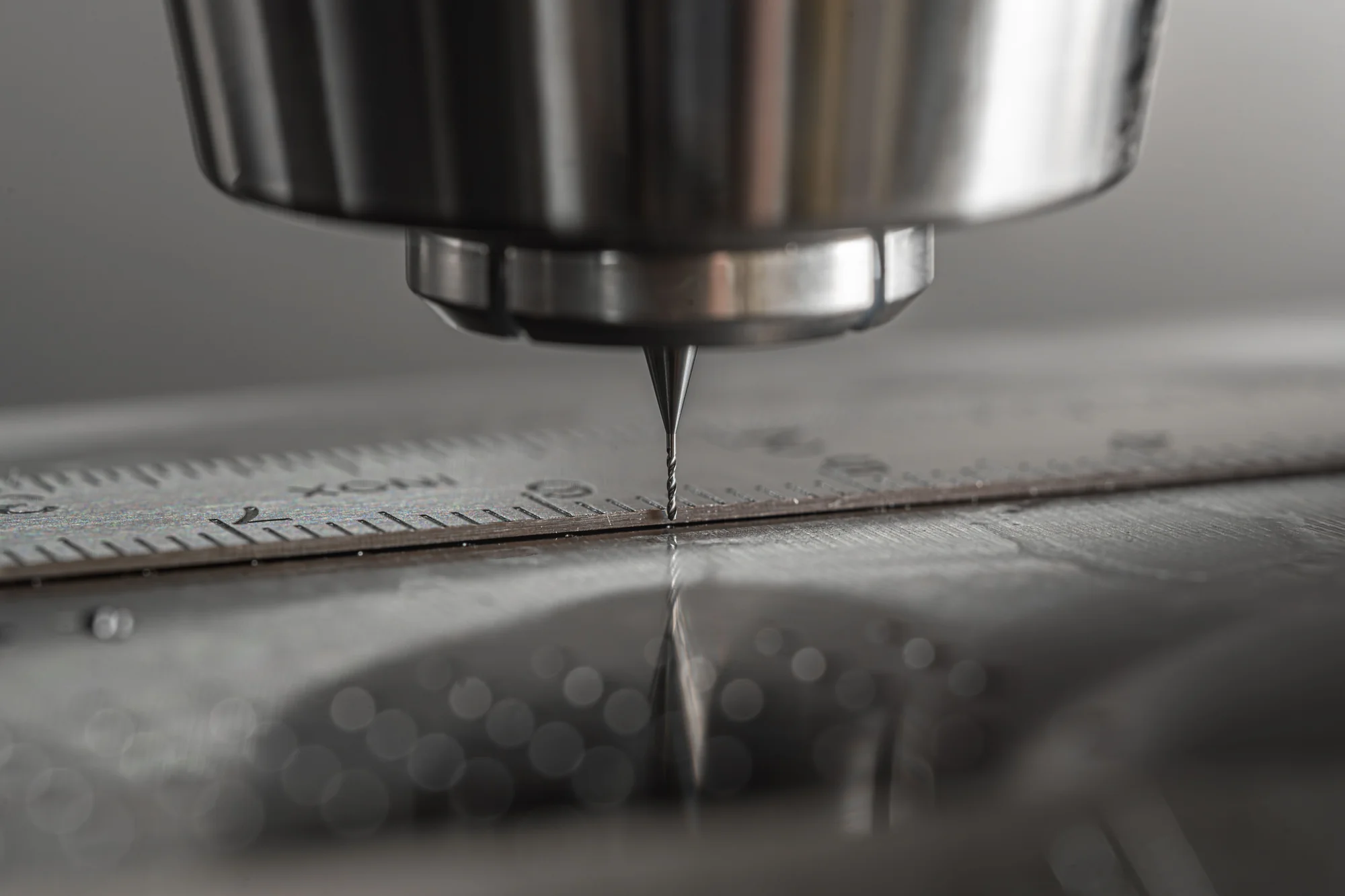 A CNC milling spindle machining a metal workpiece